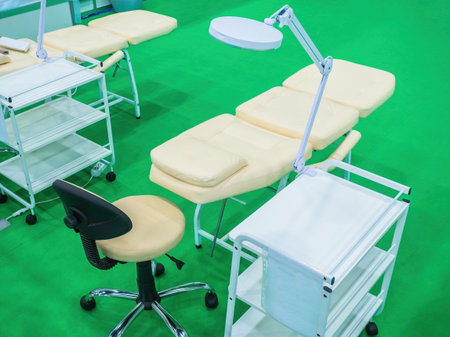 Several dental couches are nearby. Couches for visitors to dentistry. Concept - sale of dental...