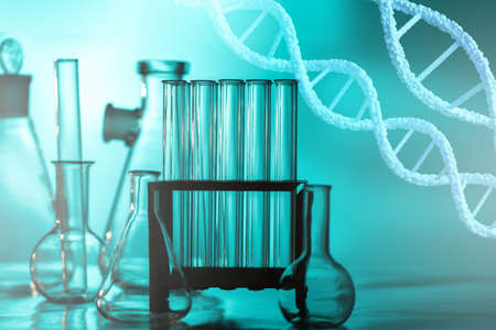 Genetic engineering. Chains of DNA molecules against the background of a research laboratory. Genetic engineering in medicine. Biotechnology and gene manipulation. Analysis of human chromosomes.の写真素材