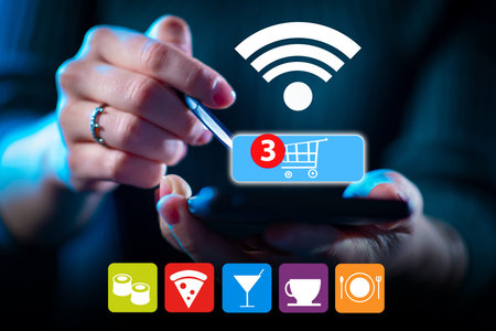 Food delivery app in mobile phone. Restaurant order online concept. Hands woman using phone with app...
