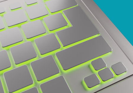 Gray keyboard. Closeup shot of computer keyboard. Keys with yellow neon illumination. Modern...