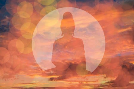 Buddhist meditation. Shakyamuni Buddha silhouette. Buddhism logo on a sunset background. Silhouette of Buddha in meditation pose. Concept - Buddhism in Japan and India. Buddhist Miditation Practicesの写真素材
