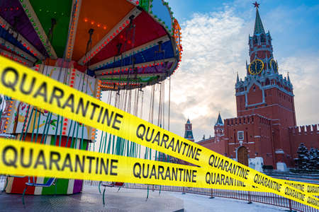 Quarantine in Moscow. Lockdown in Russia. Kremlin quarantine tape. Limiting tape on red square. Concept - ban on Christmas festivities. Christmas lockdown in Moscow. Quarantine in Russian Federationの写真素材