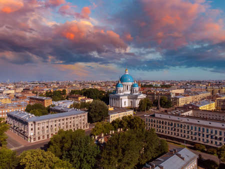 White nights in Saint-Petersburg. Russia poster. Trinity Cathedral in Petersburg. View of Saint-Petersburg from a drone. A city under a beautiful sky. City streets from the air. Russian cities.の写真素材