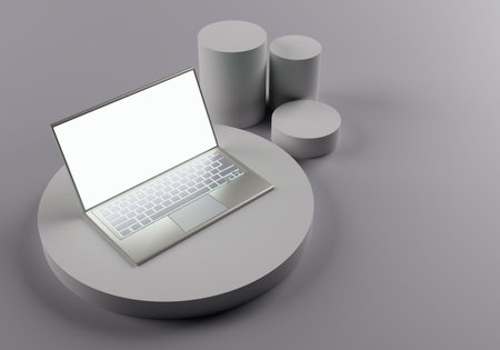 Laptop and cylinders. Laptop computer and gray geometric shapes. View of laptop from above. Open...