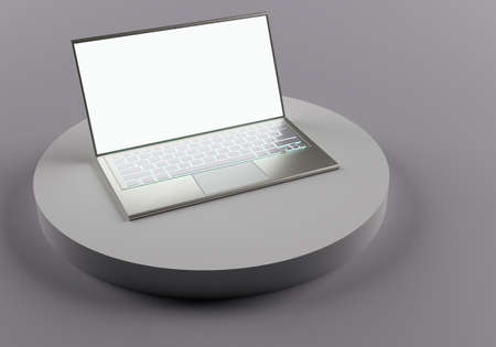 Laptop mockup. Laptop on a stand. Gray background with laptop. Portable computer stands on a gray cylinder. A gadget with a clean screen. Place for the text. Electronic notebook. 3d imageの写真素材
