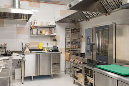 General plan of restaurant's kitchen without people. Confectionery shop in a cafe or restaurant. Confectioners or bakers kitchen. Concept - working as a baker in a restaurant. Pastry chef career.の写真素材