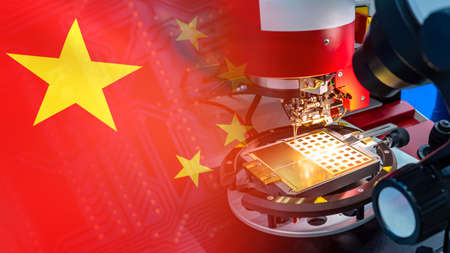China high-tech. Flag of PRC and high-tech production. Production of electronic components in China. Chinese technologies. Leadership in technology.の写真素材