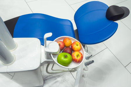 Blue chair in dentist office. Dental equipment top view. Modern dental chair. Chair in dental...