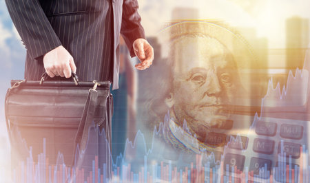 Stock exchange trading. Currency trading. Investing in stock exchange. Man with a business briefcase next to growth chart. Franklin's portrait near trader. Background on theme of trader's career.の写真素材