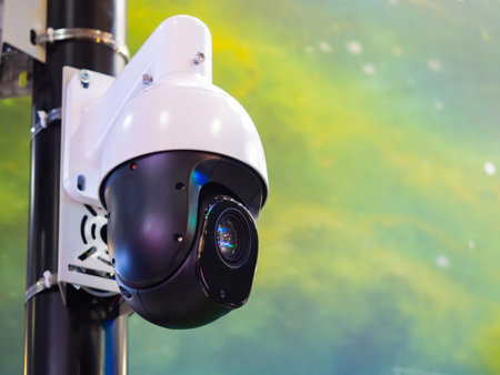Dome rotary surveillance camera. CCTV camera a light background. Outdoor high speed CCTV camera....