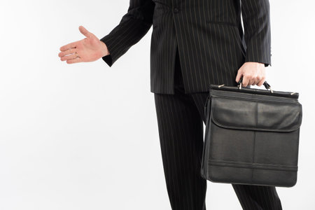 Business cooperation. Businessman makes a handshake gesture. Concept - negotiations on business...