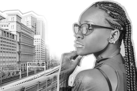 Woman is thinking about city architecture. Dark-skinned girl near skyscraper and trains. African American girl ponders city architecture. Black and white collage on theme of architecture.の写真素材