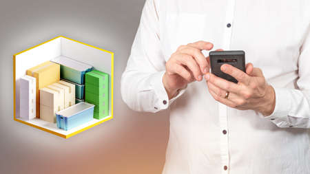 Search for Storage Units. Man is looking for Storage Units via his phone. Application for renting warehouse space. Rent small storage room. Warehouse container for business. Guy with phoneの写真素材