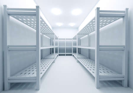 Cold warehouse. Metal racks in stock. Storage. Freezer room with shelves. High shelves in stock.の写真素材