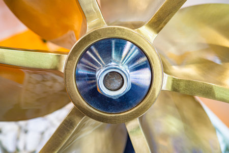 Screw propeller on the ship. Boat service. Screw propeller closeup. Small ship airscrew. New ship propeller.External skrev for the boat. Spare parts for small ships. External engine for the boatの写真素材