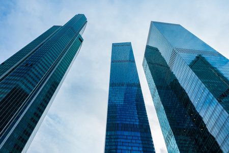 Skyscrapers against the sky. Glass skyscrapers. Downtown. Concept - sale of commercial real estate....