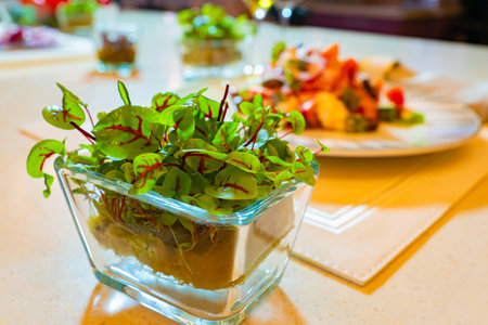 Lettuce Leaf. Concept - organic food store. Lettuce leaf in a transparent plate. Green lettuce. Healthy food. Recipe ingredients. Eco food. Concept - freshness. Cooking from eco products.の写真素材