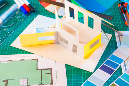 Layout of the house on the designerï¿½s desk. Artistic decoration of the walls of the house. Reconstruction of the building. Designing the facade of the building. Design of the facade of the house.の写真素材
