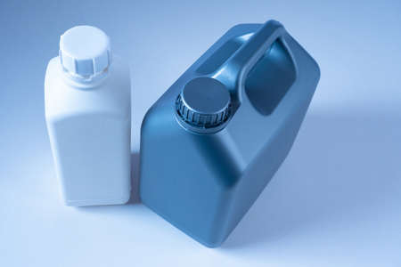 Canisters. The bottles. Concept - packaging for chemical products. Canisters for automotive chemicals. Cleaning products. Bottles without labels. Plastic dishes for cleaning products.の写真素材