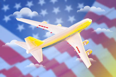 Flying in the USA. Plane on the background of the American flag. Plastic toy jet plane and flag of...