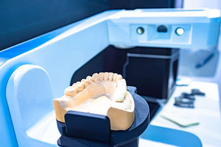 Dental laboratory. Dentist. Concept - care for dental health. Equipment for dental. Orthopedic dentistry. Prosthetics. Ceramic dentures. cermets. Concept - work by an orthodontist. Bridges denturesの写真素材