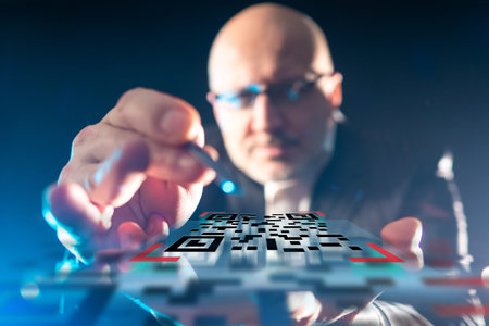 Businessman demonstrates QR code. QR code for payment services or identification concept. Businessman with stylus in his hands. Volumetric Quick Response code. Selective blurred. Business Technologyの写真素材