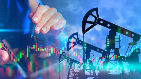 Trading in fuel market. Oil futures trading. Oil rigs next to chart. Hands with phone in background....