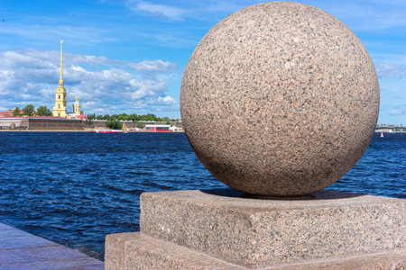Russia. Saint Petersburg. Peter and Paul Fortress in St. Petersburg. Neva River. Symbols of Petersburg. Spit of Vasilyevsky Island. Stone ball near the Peter and Paul Fortress. Balls on the waterfrontの写真素材