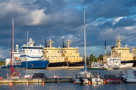 Ships Sea ships. Sea pier. Trawlers. fishing vessel. Fishing vessel at the pier. Small yachts on the background of the Trawlers. Ships on the pier. Harbor. City piersの写真素材