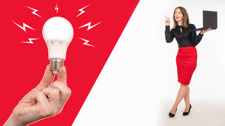 Business innovation. Businesswoman next to light bulb. She symbolizes ideas and inspiration....