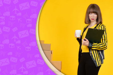 Employee of e-commerce company. Concept owner of online store. Woman next to boxes. Space for text....