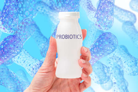 Human hand with probiotics. Probiotics naphone microbiome. Microbiome in intestinal microflora. Probiotics bacteria concept in yoghurt. Yogurt with lactobacillus acidophilus. Bifidobacteria in foodの写真素材