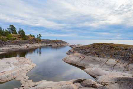 Karelia. Russia. Ladoga lake. Nature reserve Ladoga skerries. Taiga nature. Landscape with northern nature. Landscape of the Karelian National Park. Vacation in Russia. Panorama of Karelia.の写真素材