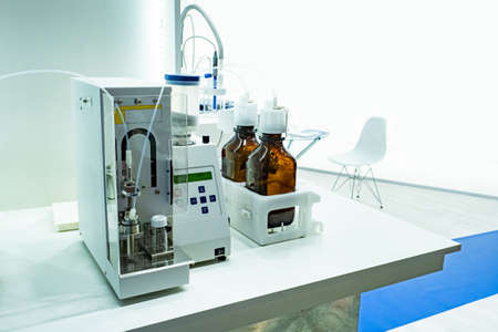 Pharmacological production. Encapsulator on laboratory bench. Encapsulation equipment on table. Sale of labequipment. Device for making medicines. Tablet testing machine. Encapsulator in labの写真素材
