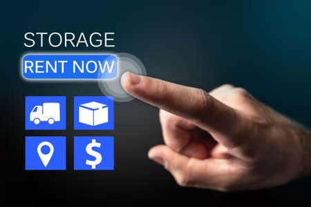 Storage Units icons near person hand. Self storage unit rental. Storage rent now inscription. Man presses rent button on virtual screen. Finding place for safekeeping of personal belongings.の写真素材