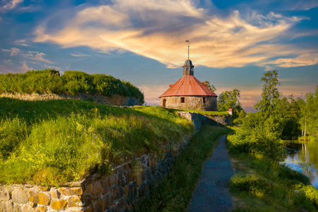 Sunset in Karelia. Russia landmarks. Fortress Korela at sunset. Nature of Republic of Karelia. Guide to Karelia. Fortress in city of Priozersk. Panorama of Russia. Excursions to Korela fortress.のeditorial素材