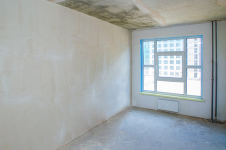 Repairs. The room is prepared for repair. A window of unusual shape in the building. The room in the...