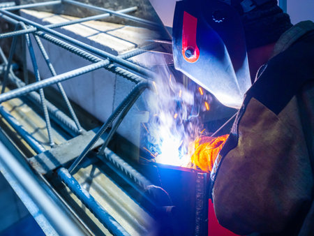 Welder is working in a protective mask. Work with welding during the construction of a house. Welder...