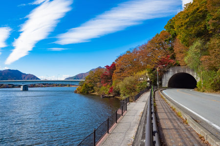 Japan. Panorama of the lake Kawaguchiko. Car tunnel near the lake. The road on the shores of Lake...