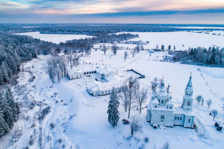 Russia. Smolensk church. Temple near Saint Petersburg. White Stone Temple. Temple in the Taiga. Monastery in the winter forest. Travel to the temples of Russia. Orthodox churches of Russia.の写真素材