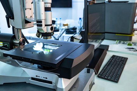 Microscope for PCB research. Electron microscope for test of PCB circuit boards. Equipment for...