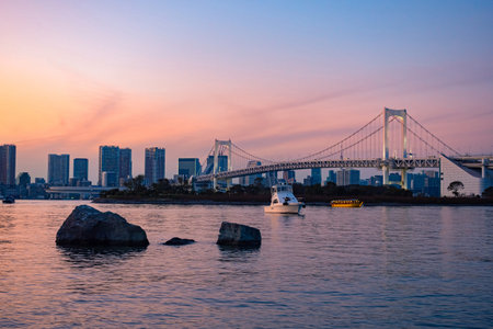 Japan. Rainbow Bridge in Tokyo. The bridge leads to the island of Odaibo. Bridge over Tokyo Bay....