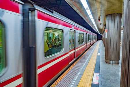 Tokyo. Japan. Wagons of the Metro train. Subway train is preparing for departure. Doors are closed. Traveling around Tokyo aa subway. Public transportation in Japan. interior. 09/11/2019のeditorial素材