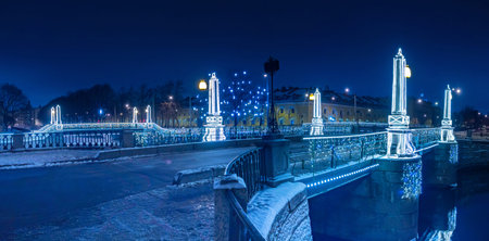 Saint-Petersburg. Russia. Streets of St. Petersburg are decorated with garlands. Night illumination of the bridge. Kryukov canal. Christmas holidays in Russia. New Year in Russian cities.の写真素材
