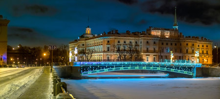 Saint-Petersburg. Russia. Mikhailovsky castle on a winter night. The bridge over the frozen Neva. Christmas illumination in front of the Mikhailovsky castle. New Year's Petersburg. Tour in Russiaのeditorial素材