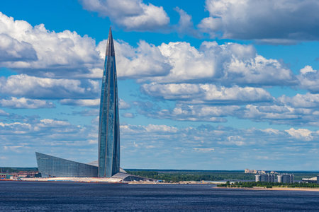 Saint-Petersburg. Russia. Skyscraper on the shore of the Gulf of Finland. High-rise building on the background of blue sky. Business in St. Petersburg. Buildings of Russia.Petersburg in sunny weatherのeditorial素材