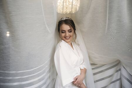 Portrait of the bride in the park. Wedding dress. Sunny day.の写真素材