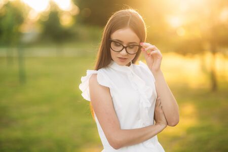 Business lady uses a tablet in the park during a breakの写真素材