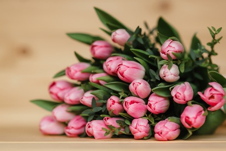 Beautiful Rustic background with pink Tulips. Colorful Card for Mothers Day, Birthday, International Womens Day March 8の写真素材