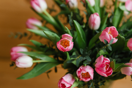 A bouquet of pink tulips in a beautiful crystal vaseの写真素材